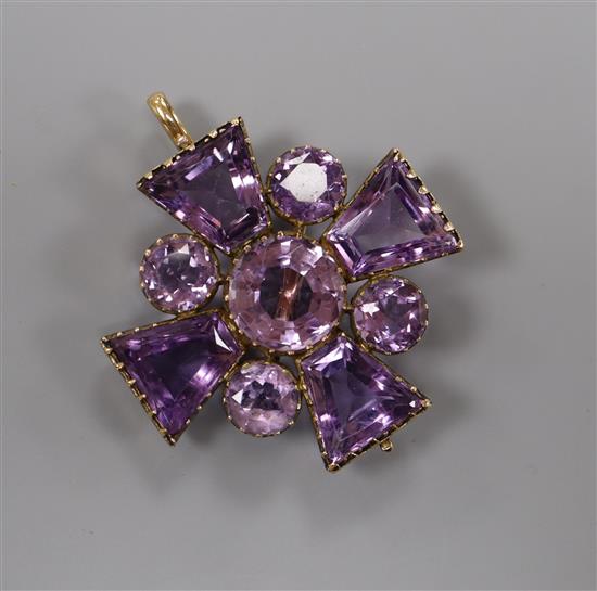 A late Victorian yellow metal and amethyst set cross pendant brooch, 38mm.